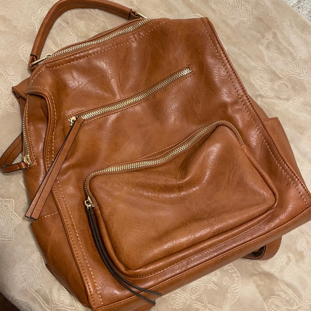 Brown leather backpack / baby bag